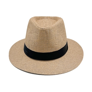 Detail shot of the tight weave and black ribbon band on this summer straw panama hat