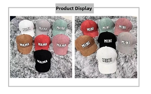 Detailed close-up of corduroy baseball caps with MAMA and MINI embroidered patches
