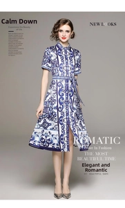 Detail of blue porcelain pattern dress with a button-down collar and matching belt