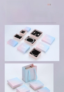 Pink and blue gradient jewelry boxes with matching gift bags and gold foil lettering
