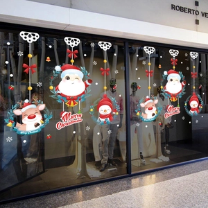 Christmas window stickers featuring Santa, reindeer and snowman for holiday glass decoration