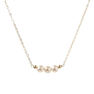 Minimalist 14K gold filled necklace featuring three natural freshwater pearls on a fine chain