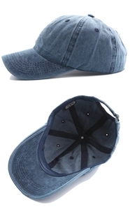 Detail view of washed cotton baseball cap showing metal buckle and inner sweatband
