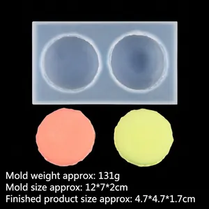 Detail view of 2-cavity silicone mold for macaron soaps and candles with finished samples
