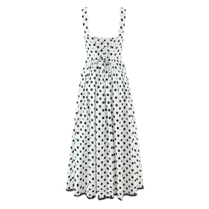 Polka dot sleeveless maxi dress with crisscross back tie and black lace hem trim