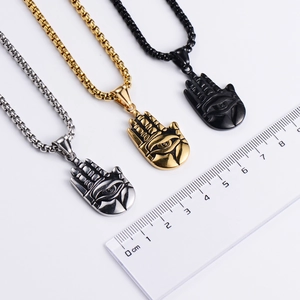 Hamsa Hand pendants in gold, silver, and black finish with detailed eye engraving