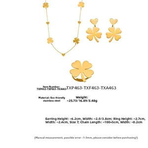 Detailed set of gold-plated stainless steel jewelry with clover and heart patterns
