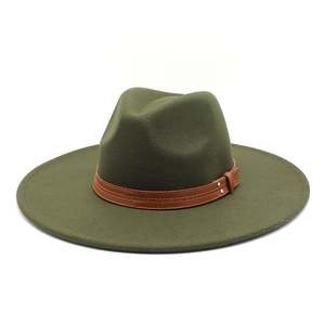Close-up of olive green wool fedora hat with brown leather band and metal rivet detail
