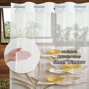 White sheer curtain with yellow 3D floral prints and silver metal grommets at the top