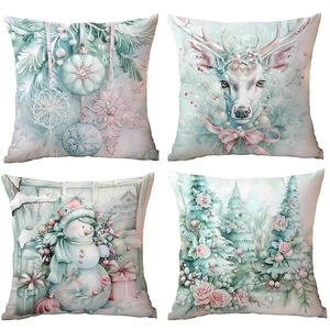 Set of 4 mint green Christmas pillow covers with reindeer and snowflake illustrations