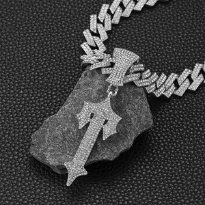 Hiphop silver Cuban chain with a large sword cross pendant set in sparkling stones