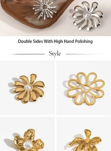 Detail of gold and silver flower brooches with pearls and high hand polishing finish