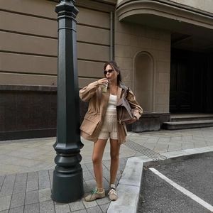 Women's khaki suede long jacket with contrast collar and large cargo pockets