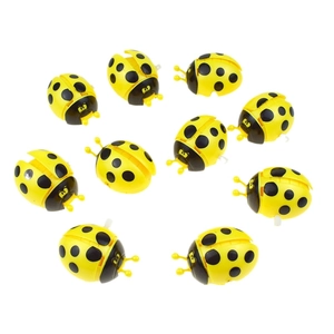 Set of 10 yellow clockwork ladybug toys with black spots for kids' gifts