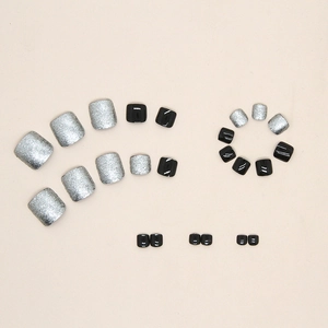 Glitter silver and solid black press-on toenails set with high-gloss mirror finish