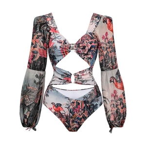 Long sleeve tropical print swimsuit with waist cut-outs and a matching sarong wrap skirt