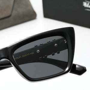 Detail shot of black cat-eye sunglasses featuring size 52-17-150 on inner temple arm
