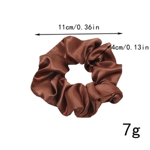 Brown satin scrunchie detail showing 11cm diameter and 4cm width measurements