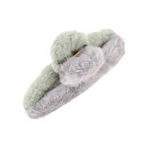 Plush shark hair claw clip in green and grey patchwork with gold metal spring