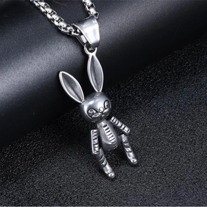 Mechanical bunny pendant necklace in silver stainless steel on black leather background