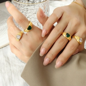 Vintage heart shaped emerald and crystal ring in gold plated titanium steel finish