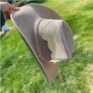 Detailed close-up of breathable mesh crown and woven decorative rope on cowboy sun hat