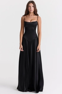 Detail of the waist triangular cutout on a black satin backless floor-length evening dress