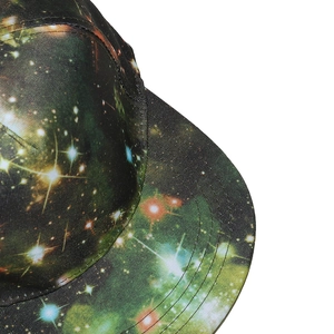 Detail of galaxy print baseball cap showing starry pattern and multi-row stitched brim
