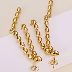 Elegant gold titanium steel long tassel earrings with polished bead drop fringe design