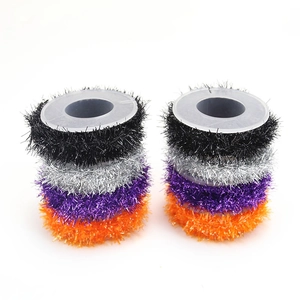 Detail of glitter tinsel wire coils in black, silver, purple, and orange for Halloween