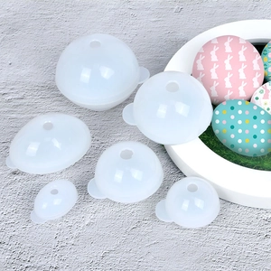 Detailed view of six translucent egg-shaped silicone molds for DIY resin craft projects