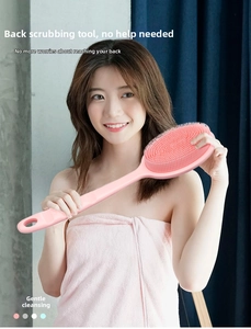 Pink silicone bath brush with long handle and soft bristles shown in multiple colors