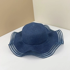 Elegant navy blue straw sun hat with wide wavy brim and sheer mesh stripe detailing