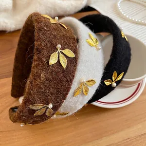 Fleece-textured headband set with golden metal leaves and pearls for women