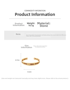 Detail view of gold-plated open cuff bracelet with stone inlay and 16.1g weight