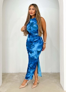 Detail view of a slim-fit navy floral maxi dress with sleeveless design and side slit