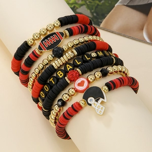 Close-up of football mom themed bracelet set with red clay beads and gold charms
