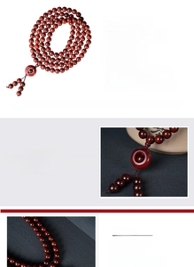 Detailed macro view of 8mm blood sandalwood 108 beads showing natural wood grain and texture