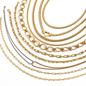 Assorted gold and silver stainless steel necklaces featuring various chain styles and designs