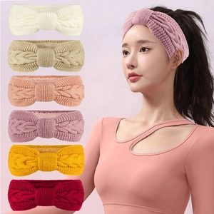 Detail view of multi-color cable knit headbands with soft fleece lining for winter