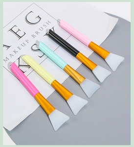 Five-piece silicone face mask brush set with colorful handles and soft white silicone tips