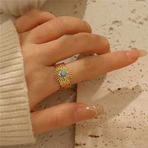 Retro gold hollow wide ring with sunburst turquoise centerpiece and hammered texture