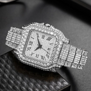 Close-up of luxury silver iced-out square watch with Roman numerals and date display