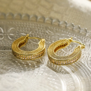 Exquisite gold-plated brass hoop earrings with micro-pave cubic zirconia on glass