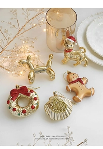 Detailed view of festive golden glitter Christmas ornaments on a warm tabletop