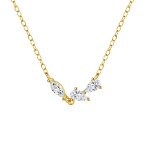 Close-up of gold s925 silver necklace with marquise and pear cut zircon cluster pendant