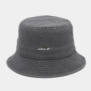 Close-up of shark embroidery on dark gray washed cotton bucket hat with eyelets