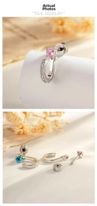 Detail view of U-shaped earrings with colorful gemstones and secure screw back design