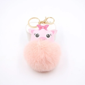 Cute pink plush pig puff keychain with gold metal ring on a clean white background