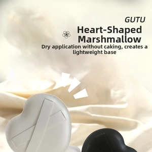 Detail of heart-shaped marshmallow makeup sponges in black and white with soft sponge texture